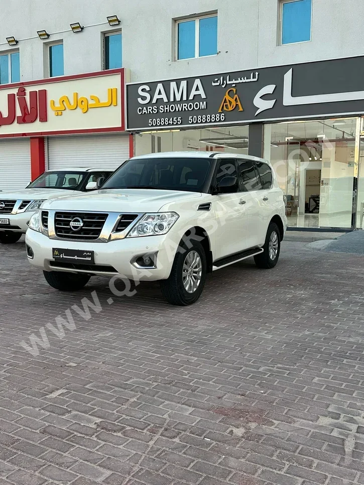 Nissan  Patrol  XE  2019  Automatic  108,000 Km  6 Cylinder  Four Wheel Drive (4WD)  SUV  White