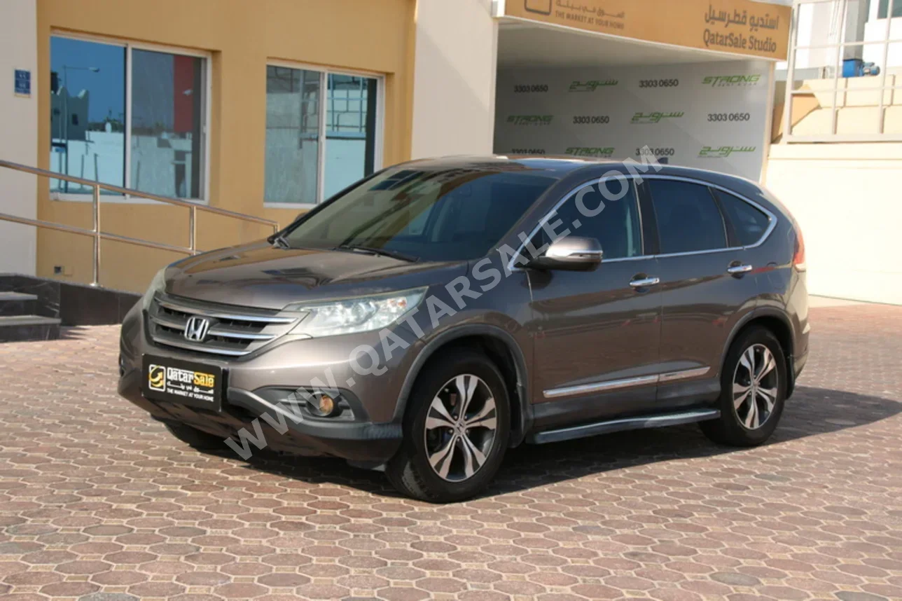 Honda  CRV  2013  Automatic  355,000 Km  4 Cylinder  Front Wheel Drive (FWD)  SUV  Gray