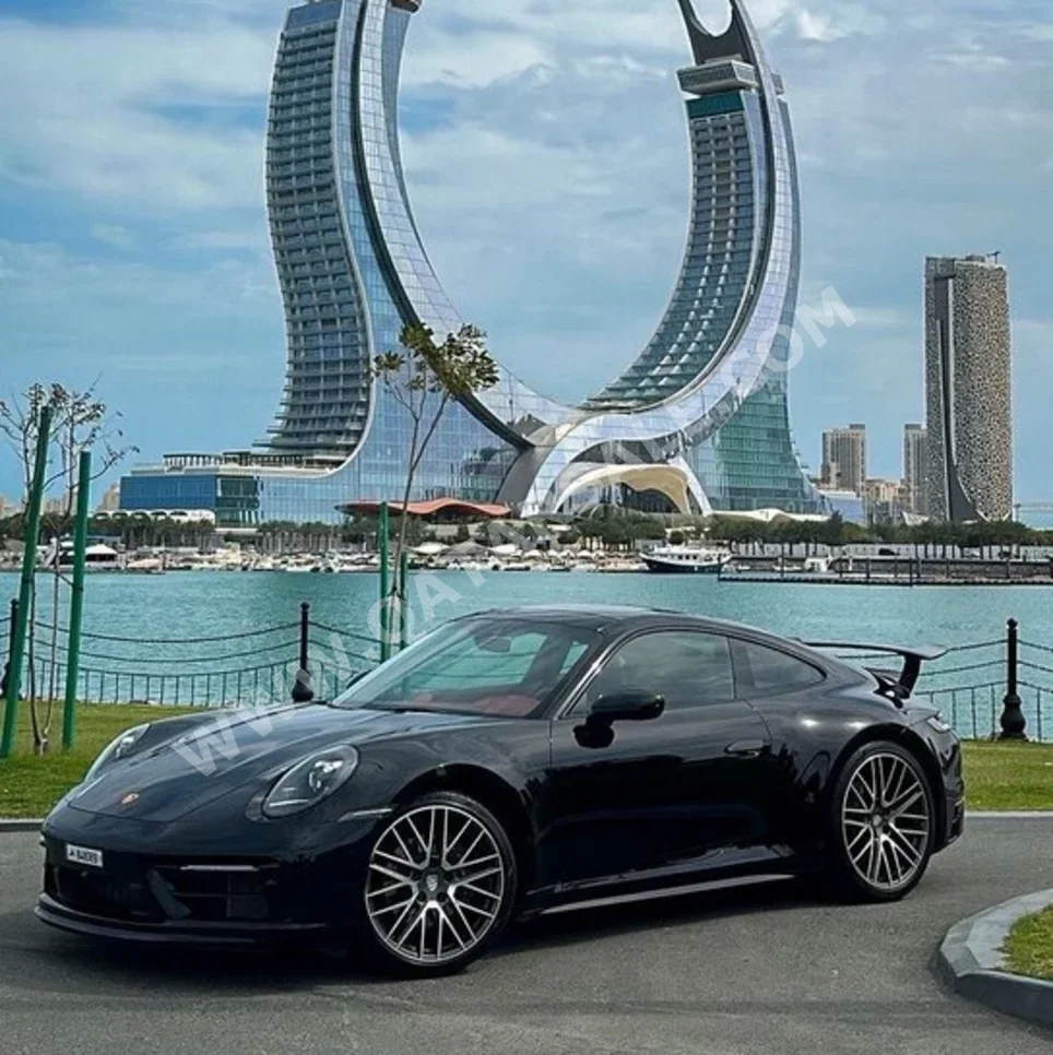 بورش  911  كاريرا  2022  اوتوماتيك  70,500 كم  6 سلندر  دفع خلفي  كوبيه \ سبورت  أسود  تحت الضمان