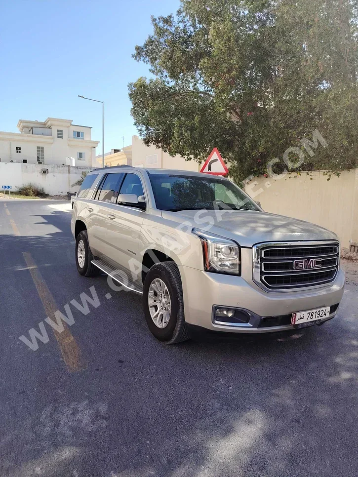 GMC  Yukon  SLE  2015  Automatic  208,000 Km  8 Cylinder  Rear Wheel Drive (RWD)  SUV  Silver
