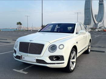 بنتلي  بينتايجا  2018  اوتوماتيك  165,000 كم  12 سلندر  دفع رباعي  اس يو في  أبيض