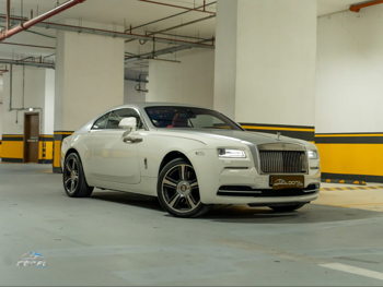 رولز - رويس  رايث  اريس ادشن  2014  اوتوماتيك  41,800 كم  12 سلندر  دفع كلي مستمر  سيدان  ابيض و رمادي