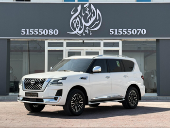 Nissan  Patrol  Platinum  2023  Automatic  33,000 Km  6 Cylinder  Four Wheel Drive (4WD)  SUV  White  With Warranty