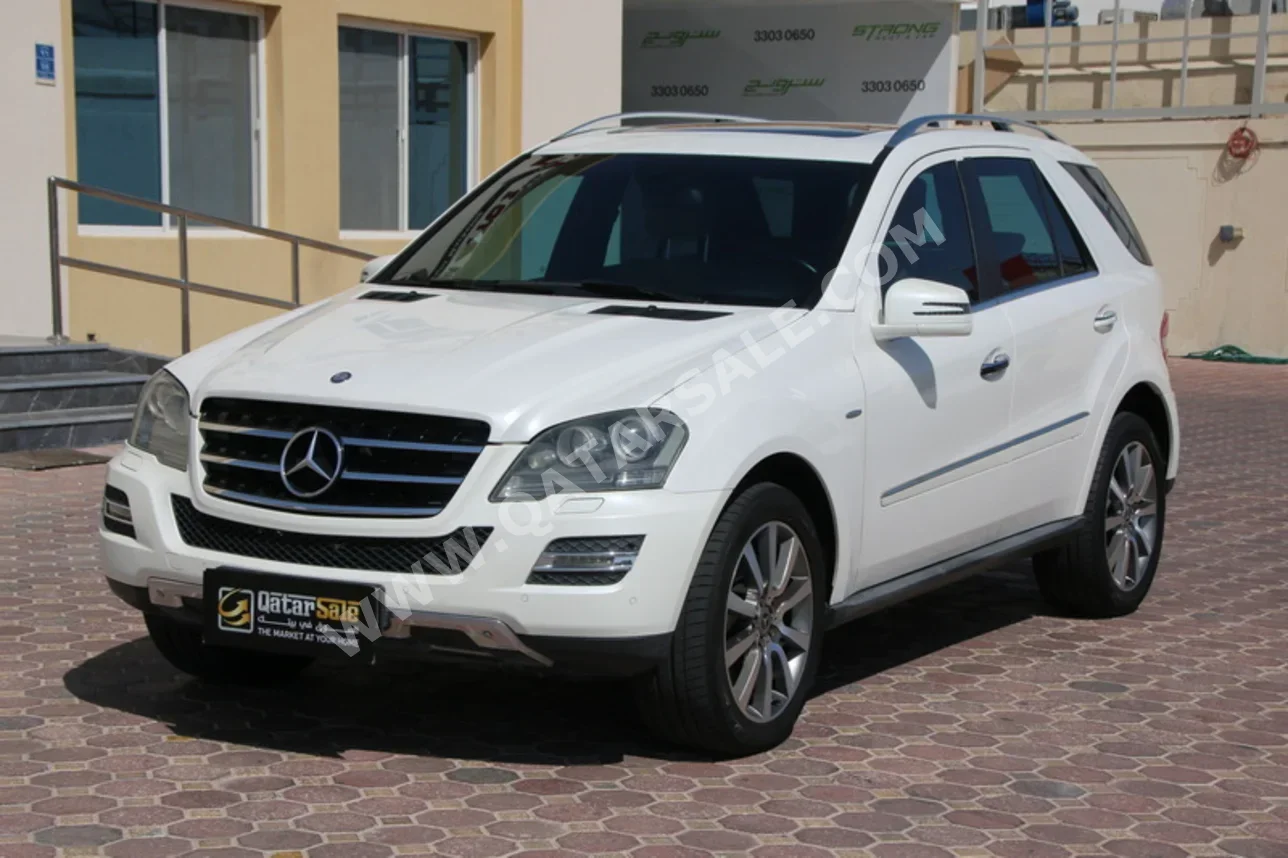 مرسيدس - بنز  ام ال  500  2011  اوتوماتيك  83,000 كم  8 سلندر  دفع رباعي  اس يو في  أبيض