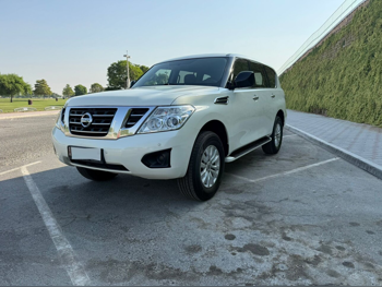 Nissan Patrol XE 2018 Automatic 99,000 Km 6 Cylinder Four Wheel Drive (4WD) SUV White