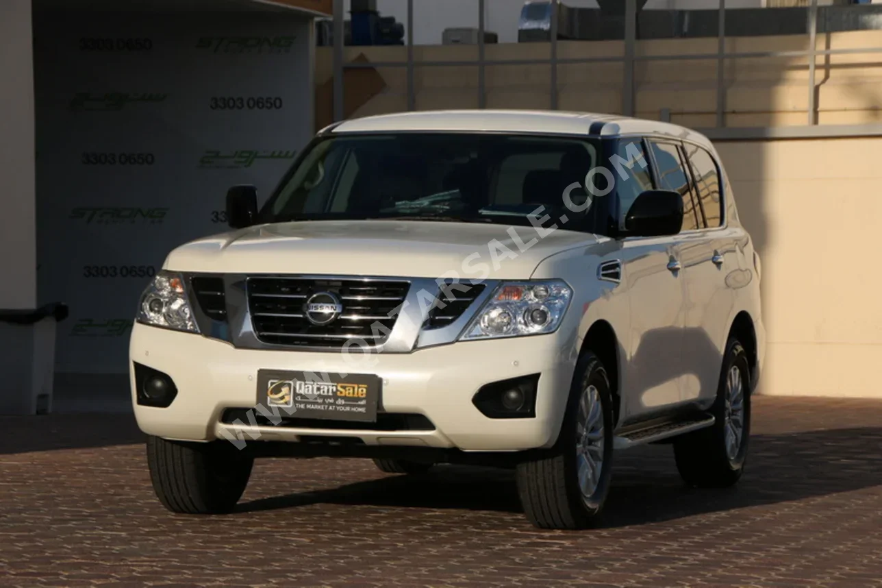 نيسان  باترول  أكس أي  2018  اوتوماتيك  99,000 كم  6 سلندر  دفع رباعي  اس يو في  أبيض