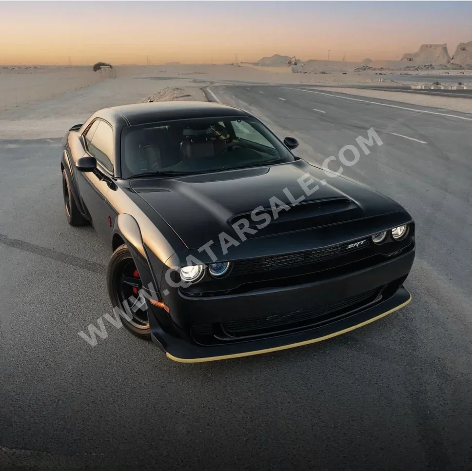 Dodge  Challenger  SRT  2016  Automatic  162,000 Km  8 Cylinder  Rear Wheel Drive (RWD)  Coupe / Sport  Black