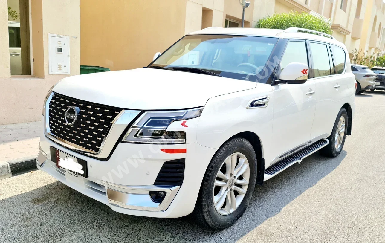 Nissan  Patrol  Platinum  2012  Automatic  142,150 Km  8 Cylinder  Four Wheel Drive (4WD)  SUV  Pearl