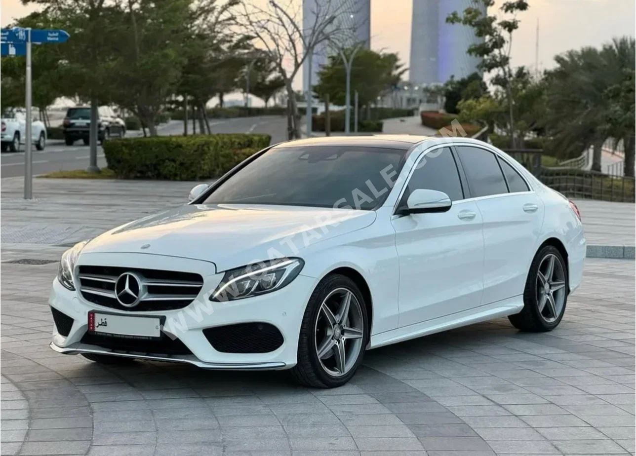 Mercedes-Benz  C-Class  200 AMG  2015  Automatic  89,000 Km  4 Cylinder  Rear Wheel Drive (RWD)  Sedan  White