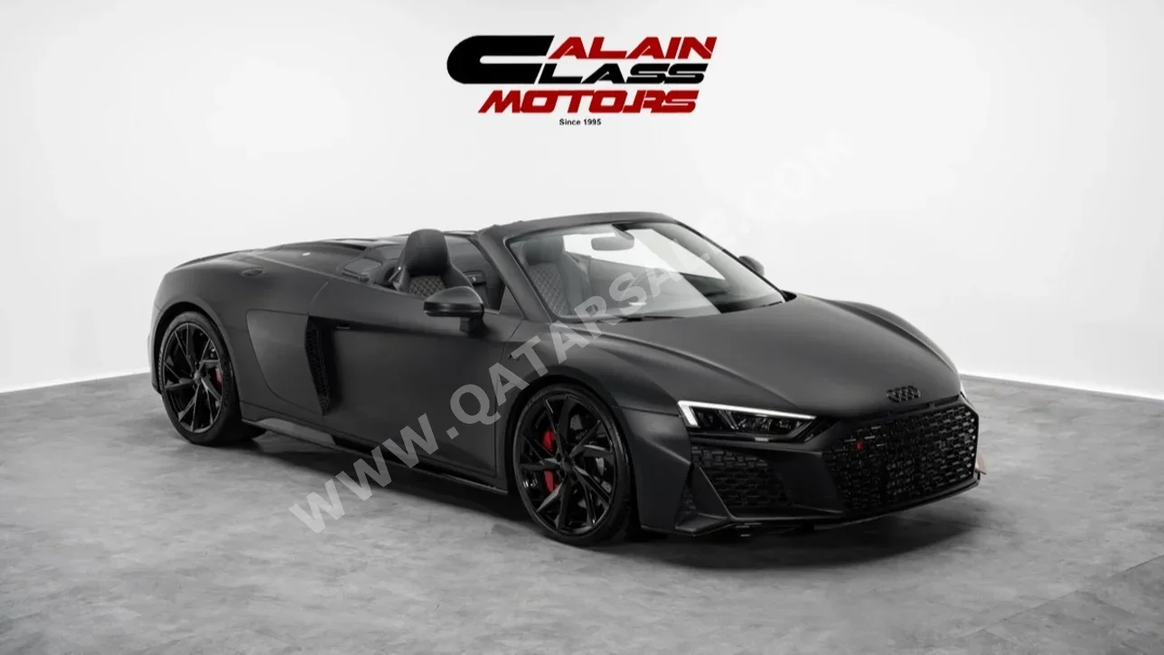 اودي  آر 8  سبايدر في 10  2023  اوتوماتيك  10,155 كم  10 سلندر  دفع خلفي  كشف  أسود