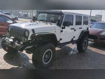 Jeep  Wrangler  Sahara  2015  Automatic  22,000 Km  6 Cylinder  Four Wheel Drive (4WD)  SUV  White
