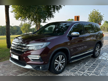 Honda  Pilot  EXL  2016  Automatic  105,000 Km  6 Cylinder  All Wheel Drive (AWD)  SUV  Maroon