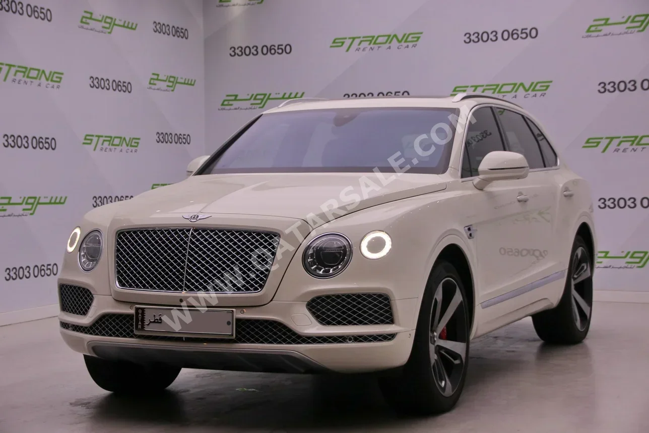 بنتلي  بينتايجا  2018  اوتوماتيك  64,000 كم  12 سلندر  دفع رباعي  اس يو في  أبيض لؤلؤي