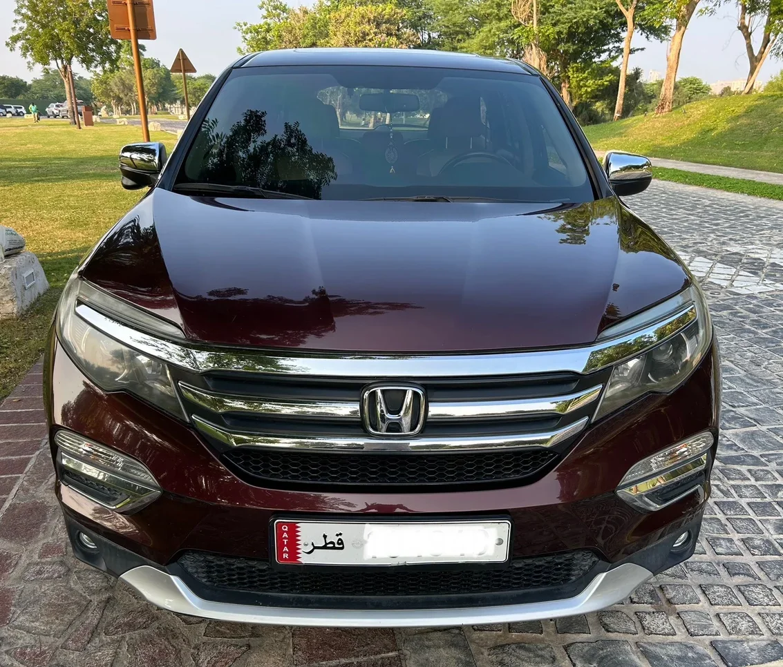 Honda  Pilot  EXL  2016  Automatic  102,000 Km  6 Cylinder  All Wheel Drive (AWD)  SUV  Maroon