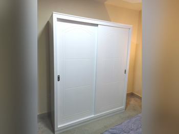 خزائن ودواليب الملابس والزينة - دوحة فيرنيتشر - خزائن - أبيض