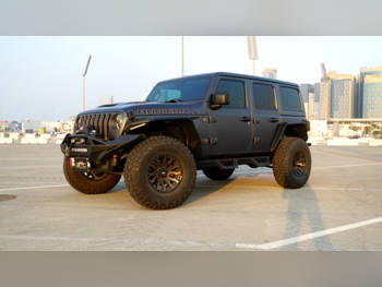 جييب رانجلار 392 روبيكون 2021 اوتوماتيك 65,000 كم 8 سلندر دفع رباعي اس يو في رمادي ناردو تحت الضمان