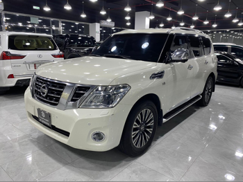 Nissan  Patrol  Platinum  2014  Automatic  195,000 Km  8 Cylinder  Four Wheel Drive (4WD)  SUV  White