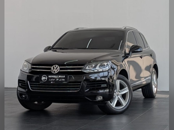 Volkswagen  Touareg  Sport  2012  Automatic  142,350 Km  6 Cylinder  All Wheel Drive (AWD)  SUV  Black