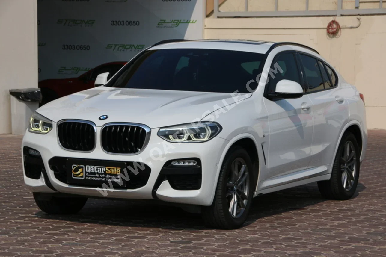 BMW  X-Series  X4  2019  Automatic  77,000 Km  4 Cylinder  Four Wheel Drive (4WD)  SUV  White