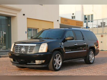 Cadillac  Escalade  2010  Automatic  142,000 Km  8 Cylinder  Four Wheel Drive (4WD)  SUV  Black