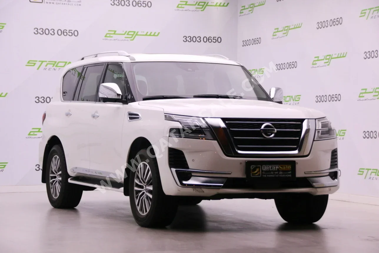 Nissan  Patrol  Platinum  2020  Automatic  74,000 Km  6 Cylinder  Four Wheel Drive (4WD)  SUV  White