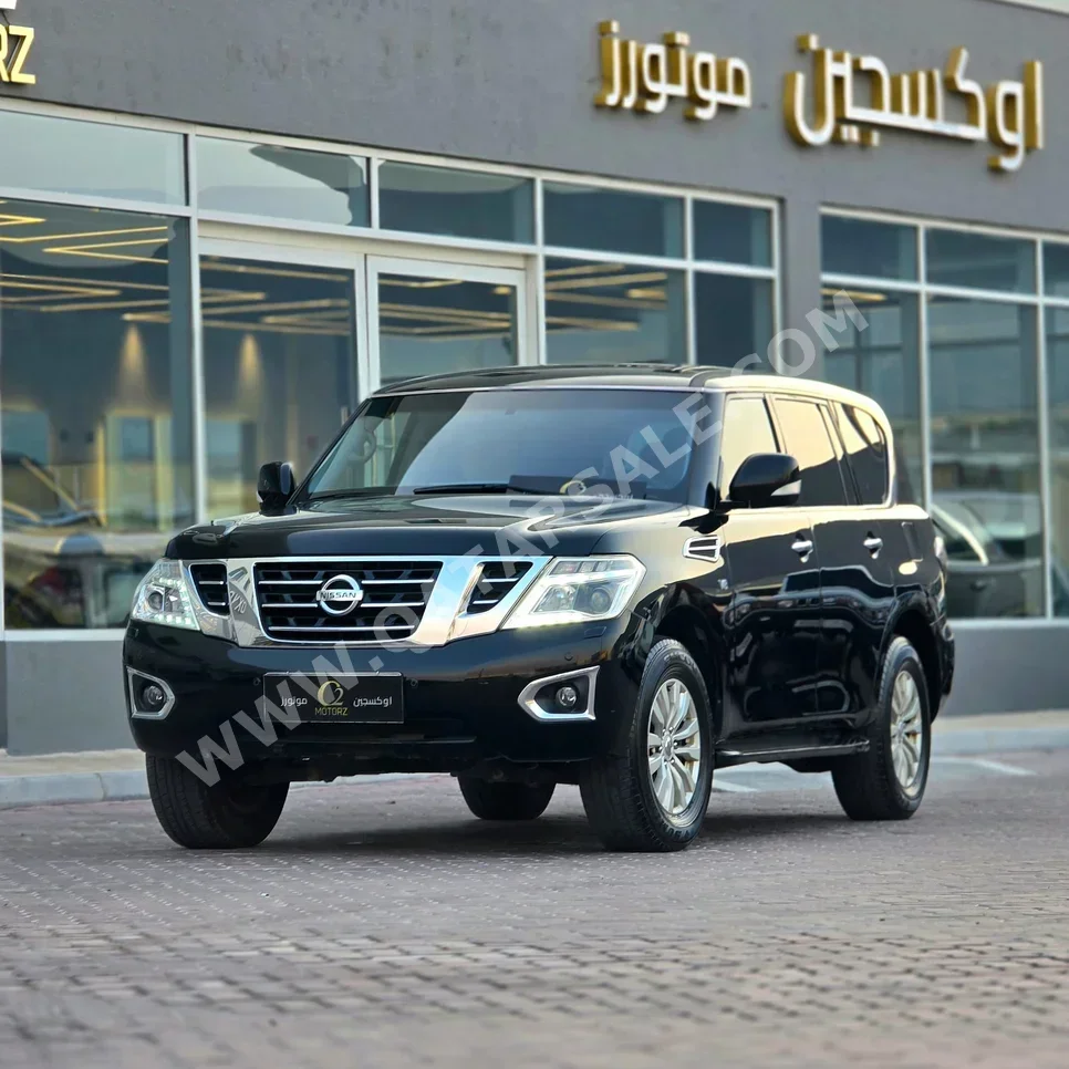 Nissan Patrol SE 2014 Automatic 313,000 Km 8 Cylinder Four Wheel Drive (4WD) SUV Black
