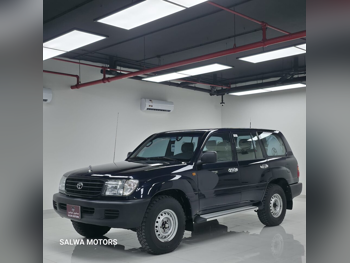 تويوتا لاند كروزر جي 1999 عادي 264,000 كم 6 سلندر دفع رباعي اس يو في أزرق غامق