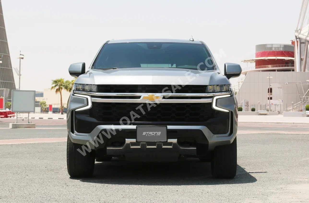 Chevrolet  Tahoe  8 Cylinder  SUV ( AWD )  Gray Metallic  2023