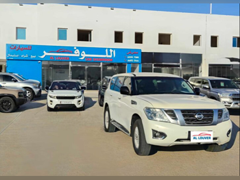 نيسان  باترول  أكس أي  2017  اوتوماتيك  256,000 كم  6 سلندر  دفع رباعي  اس يو في  أبيض