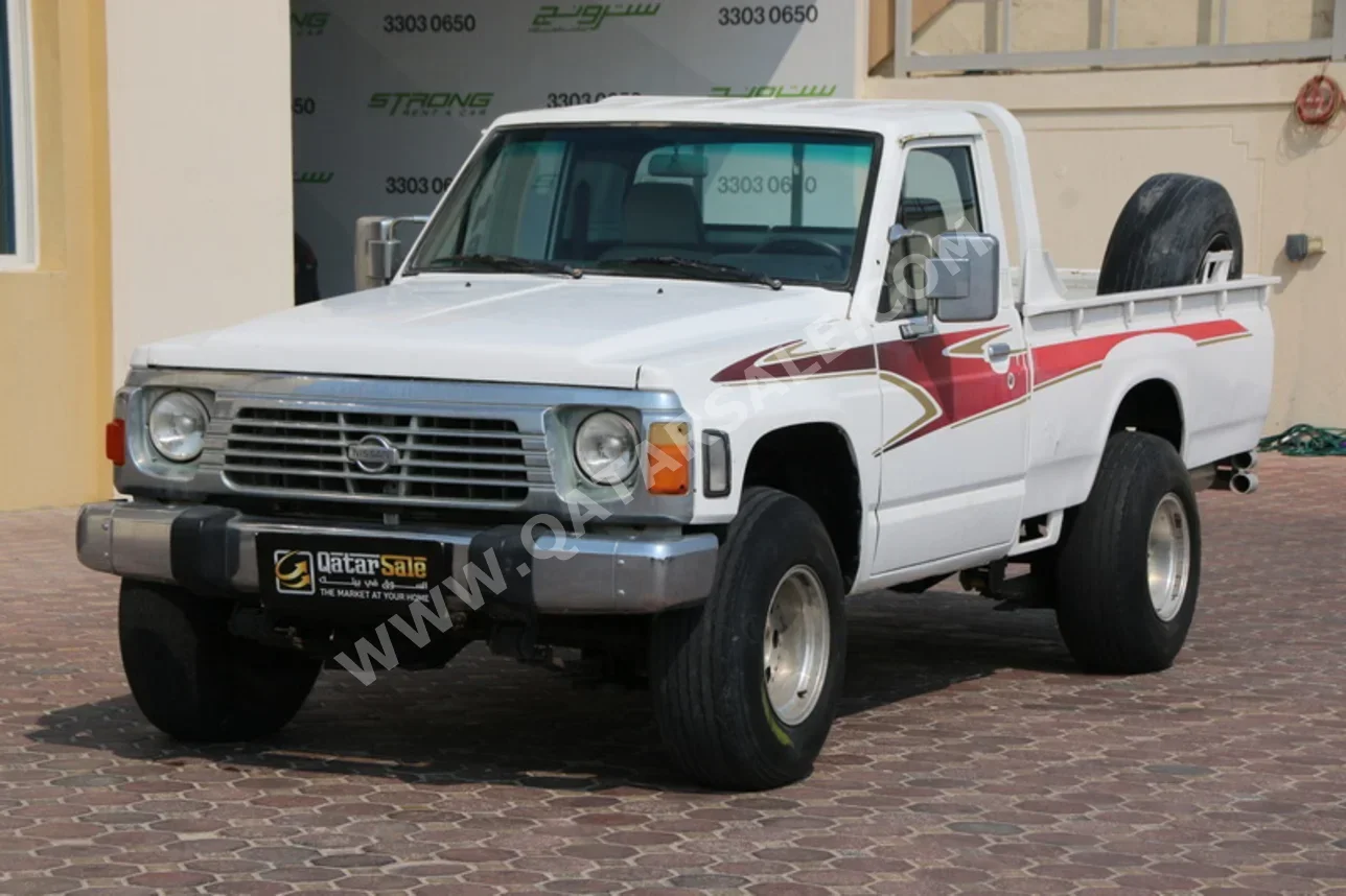 Nissan  Patrol  Pickup  1991  Manual  330,000 Km  6 Cylinder  Four Wheel Drive (4WD)  Pick Up  White
