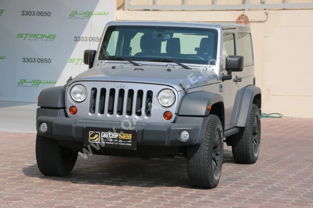 Jeep  Wrangler  Rubicon  2013  Automatic  139,000 Km  6 Cylinder  Four Wheel Drive (4WD)  SUV  Silver
