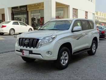 تويوتا  برادو  تي اكس ال  2015  اوتوماتيك  185,000 كم  4 سلندر  دفع رباعي  اس يو في  أبيض و أسود