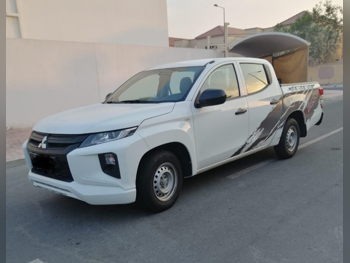 ميتسوبيشي ال 200 2020 عادي 169,000 كم 4 سلندر دفع خلفي بيكب أبيض