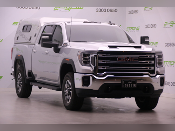 جي ام سي  سييرا  2500 HD  2023  اوتوماتيك  2,500 كم  8 سلندر  دفع رباعي  بيكب  فضي  تحت الضمان