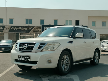 نيسان  باترول  ال اي  2012  اوتوماتيك  320,000 كم  8 سلندر  دفع رباعي  اس يو في  أبيض