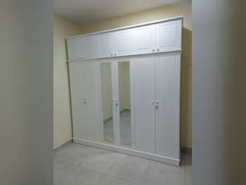 خزائن ودواليب الملابس والزينة - دوحة فيرنيتشر - خزائن - أبيض