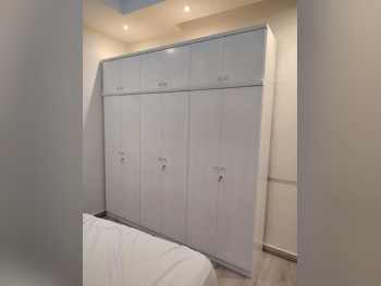 خزائن ودواليب الملابس والزينة - دوحة فيرنيتشر - خزائن - أبيض