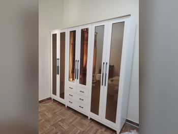 خزائن ودواليب الملابس والزينة - دوحة فيرنيتشر - خزائن - أبيض