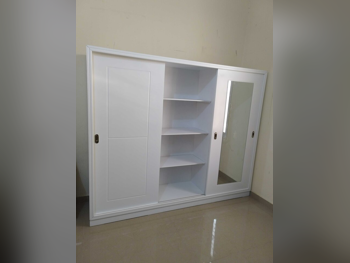 خزائن ودواليب الملابس والزينة - دوحة فيرنيتشر - خزائن - أبيض