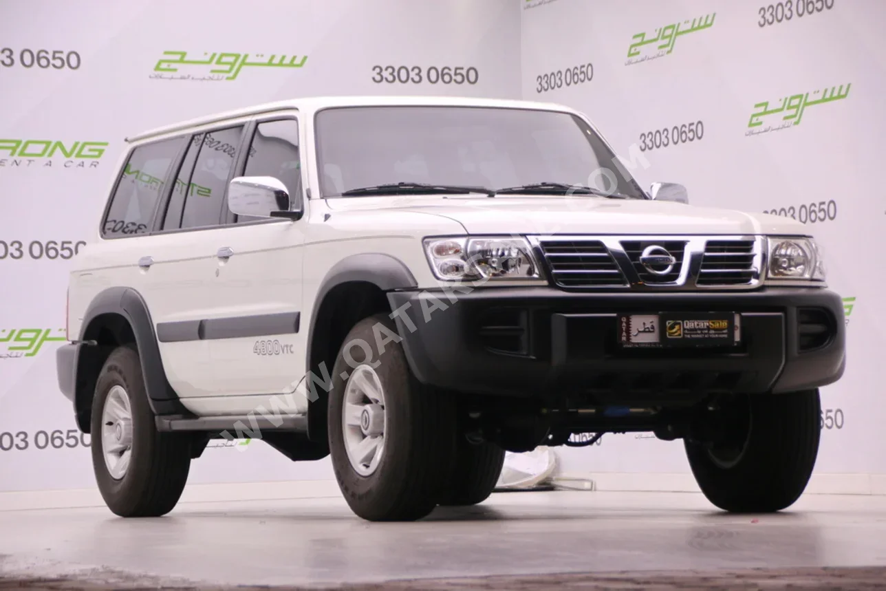 نيسان باترول اس جي ال 2002 عادي 101,000 كم 6 سلندر دفع رباعي اس يو في أبيض