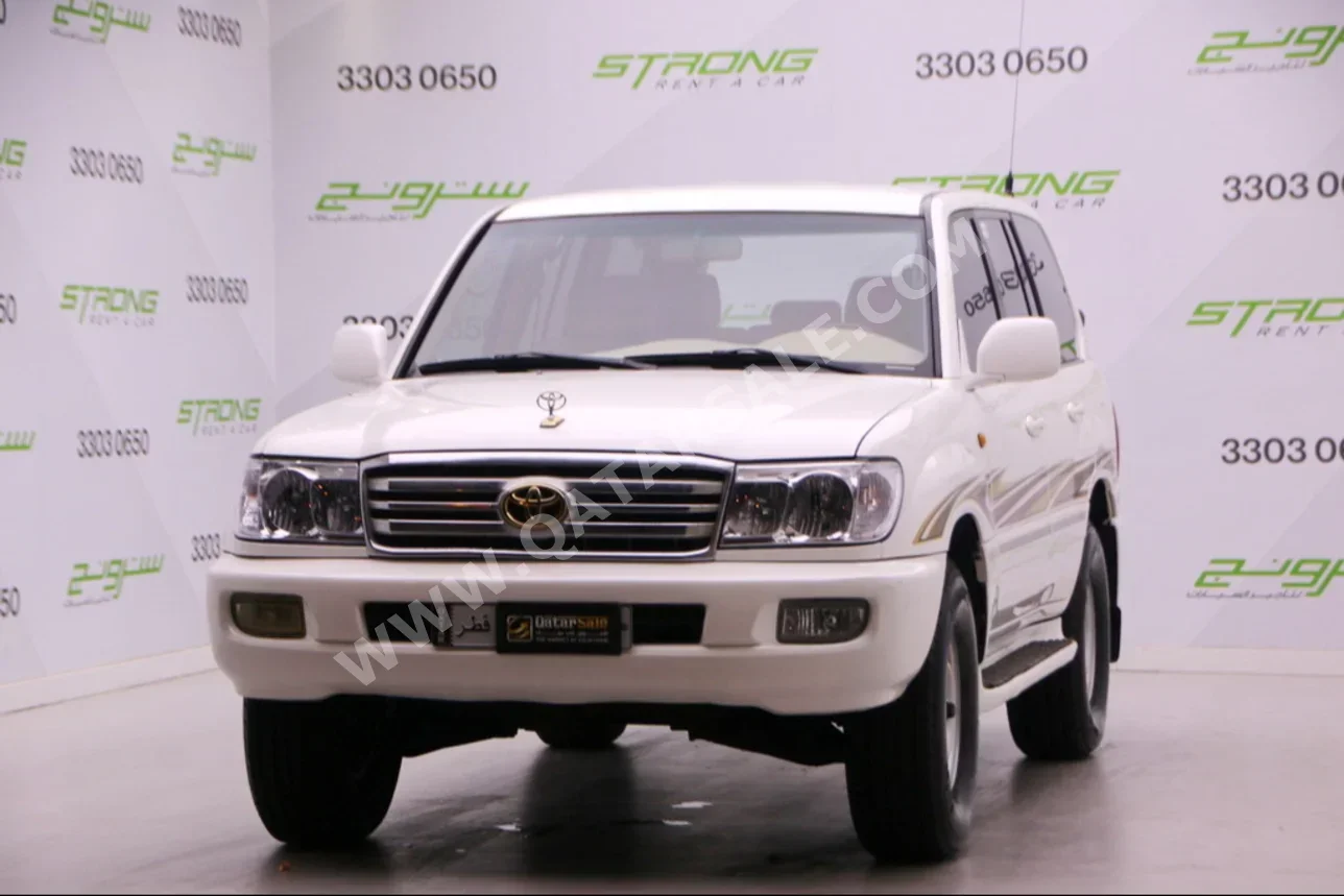 Toyota  Land Cruiser  GXR  2006  Automatic  414,000 Km  6 Cylinder  Four Wheel Drive (4WD)  SUV  Pearl