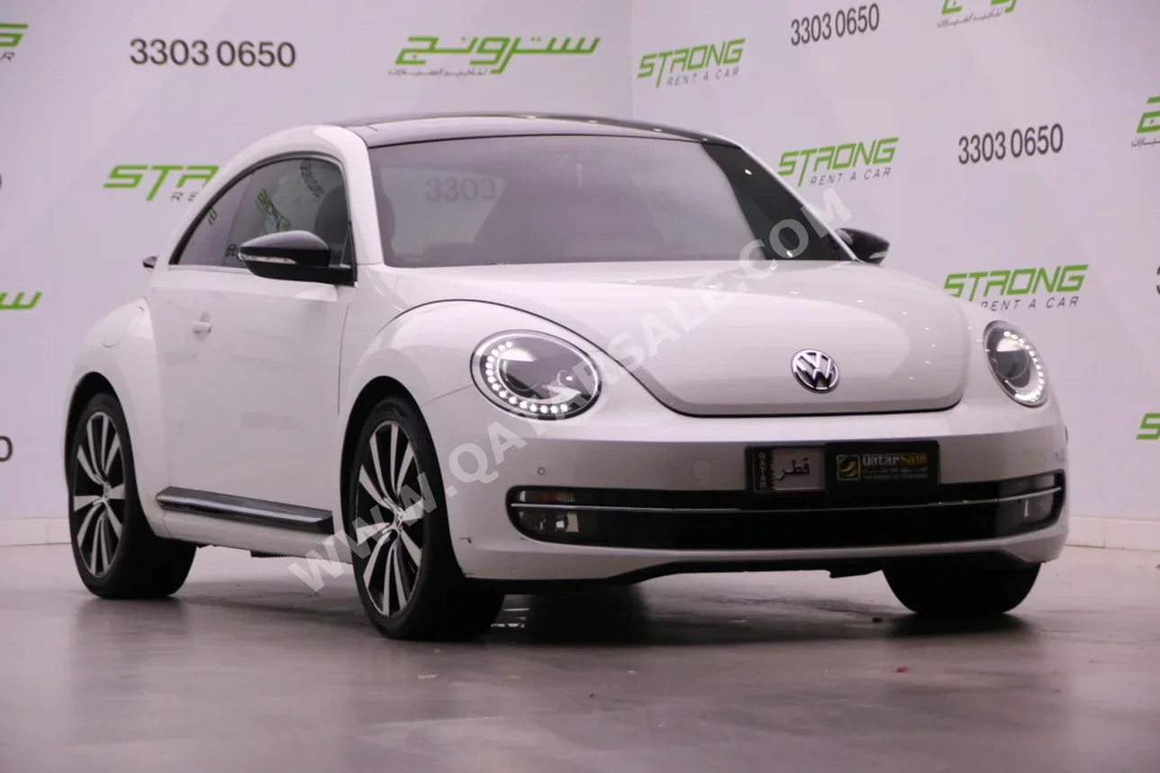 فوكس واغن بيتل توربو 2016 اوتوماتيك 92,000 كم 4 سلندر دفع خلفي هاتشباك أبيض