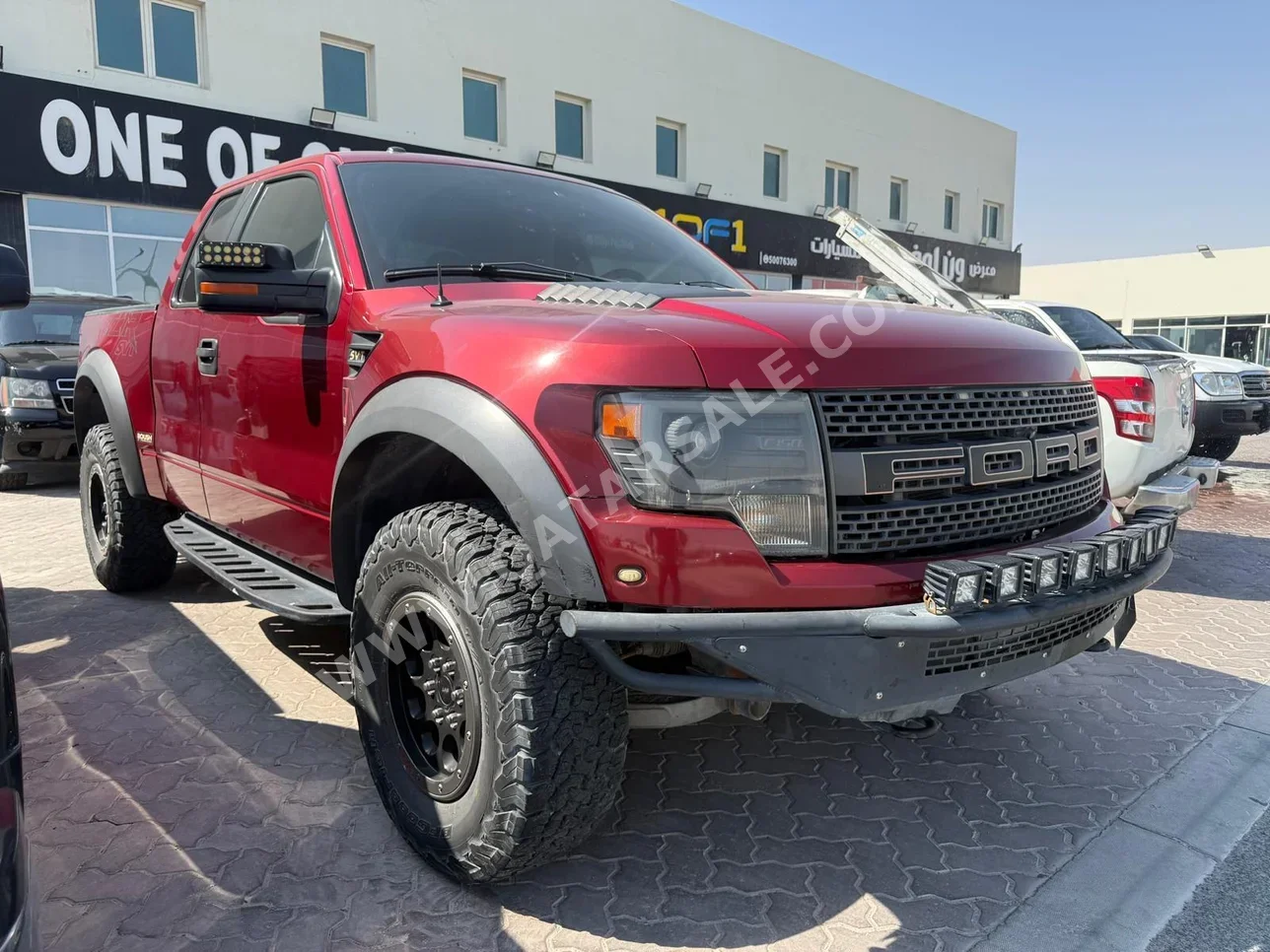 فورد رابتر 2014 اوتوماتيك 180,000 كم 6 سلندر دفع رباعي بيكب أحمر