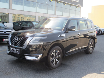 Nissan  Patrol  Titanium  2023  Automatic  22,000 Km  8 Cylinder  Four Wheel Drive (4WD)  SUV  Black