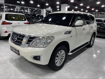 Nissan  Patrol  SE  2015  Automatic  154,000 Km  8 Cylinder  Four Wheel Drive (4WD)  SUV  White