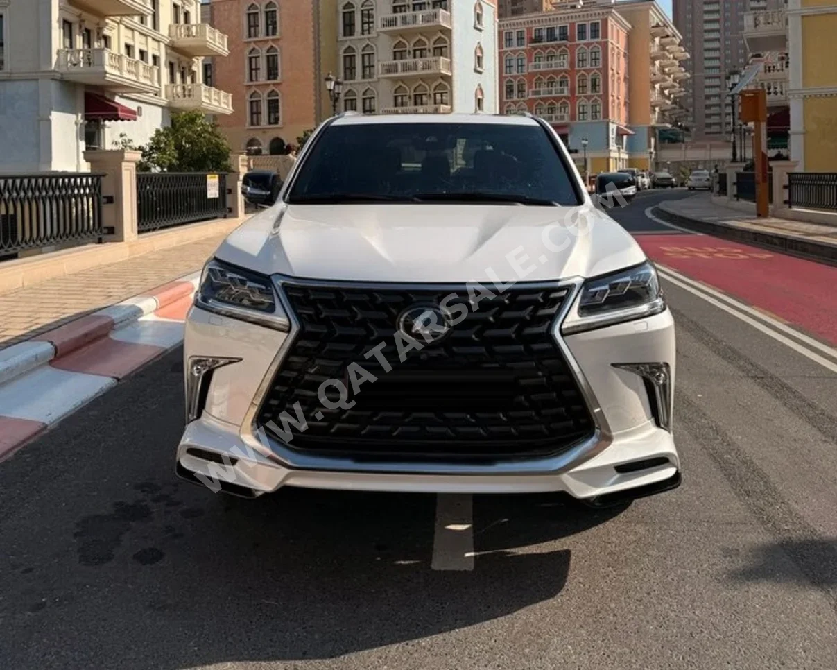 لكزس ال اكس 570 اس 2021 اوتوماتيك 56,000 كم 8 سلندر دفع رباعي اس يو في أبيض لؤلؤي