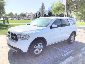 دودج دورانغو 2014 اوتوماتيك 165,000 كم 6 سلندر دفع كلي مستمر اس يو في أبيض