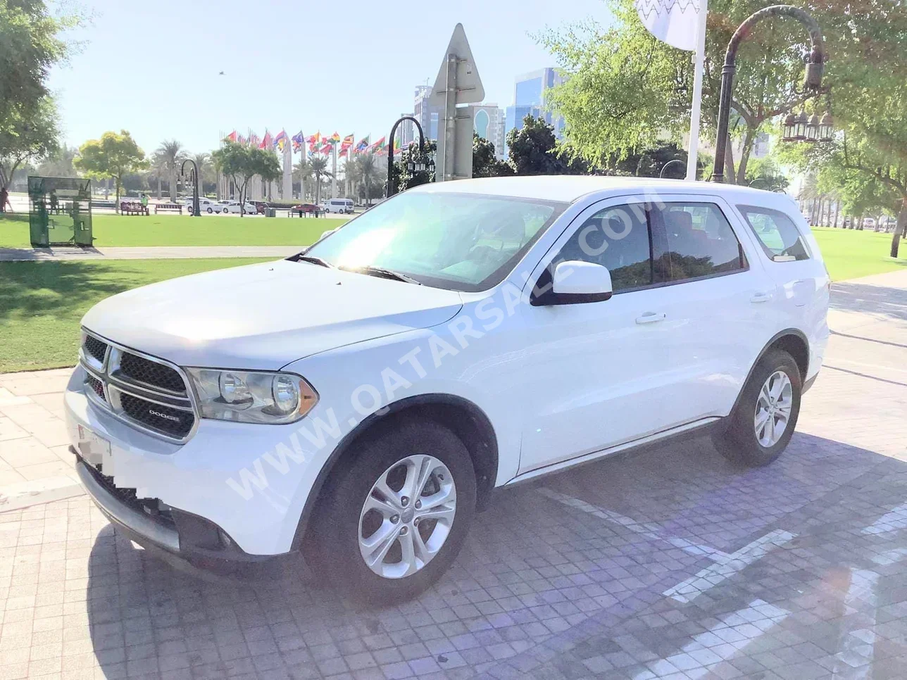دودج دورانغو 2014 اوتوماتيك 165,000 كم 6 سلندر دفع كلي مستمر اس يو في أبيض