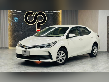 تويوتا كورولا 2017 اوتوماتيك 69,000 كم 4 سلندر سحب امامي سيدان أبيض