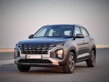 هيونداي كريتا ديلوكس 2025 اوتوماتيك 0 كم 4 سلندر سحب امامي اس يو في رمادي تحت الضمان